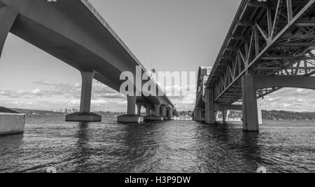 A view from under the I-90 bridge in Seattle, Washington. Black and white image. Stock Photo