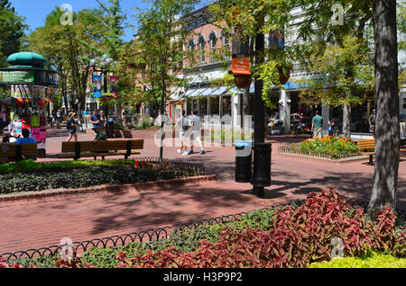 Pedestrians visit Pearl Street during a late summer weekend Stock Photo