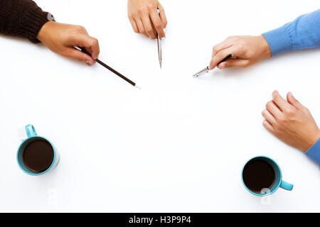 White workspace and hands pointing Stock Photo