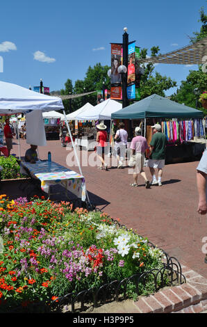 Pedestrians visit Pearl Street during a late summer weekend Stock Photo