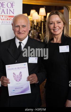 Billy Muir, with Carol Vorderman, who has been named as a finalist for the TSB Community Partnership Award at the Pride Of Britain Awards launch in the State Rooms of Speakers House, Houses of Parliament, London. Stock Photo