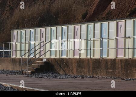 Pastel beach huts at Sidmouth beach in Devon. Stock Photo