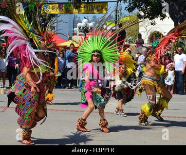 Native Aztec Dancers perform on Olvera street in Downtown Los Angeles, America, USA Stock Photo