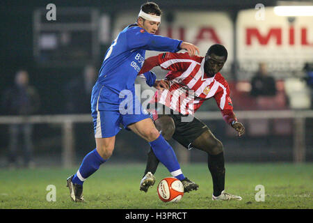 Ryan Salmon of Aveley and Tambeson Eyong of Hornchurch - AFC Hornchurch vs Aveley - Ryman League Premier Division Football at The Stadium - 08/03/11 Stock Photo