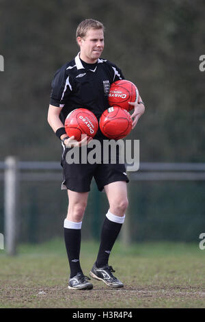 Referee Ramsey carries three red balls for Comic Relief - Potters Bar Town vs Romford - Ryman League Division One North Football - 12/03/11 Stock Photo