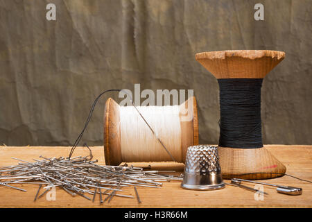two spools of thread with thimble Stock Photo