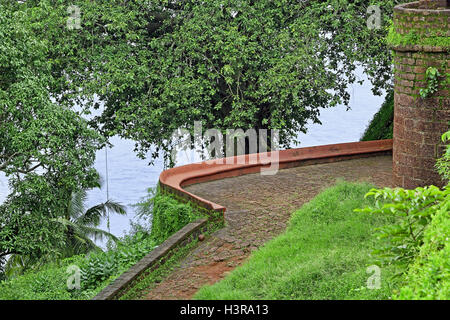 Stone paved entrance path to Portuguese era Reis Magos Fort in Goa, India Stock Photo