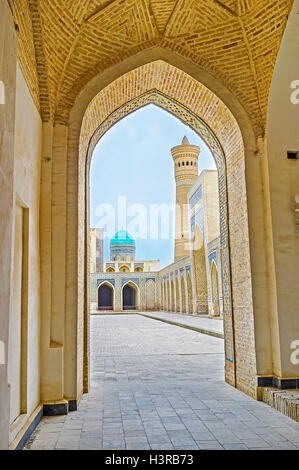 The view on the courtyard of the Kalyan Mosque from its shady gallery, Bukhara, Uzbekistan. Stock Photo