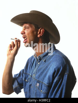 Man, stetson, cigarette, facial play, scepticism, portrait, inside, young, jeans shirt, fiercely, hostilely, mistrust, distrustfully, discord, irritable, Miss-humorously, annoys, annoyance, dissatisfied, irritable, wearily, loathing, disgust, surfeit, dis
