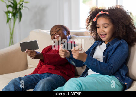 Children using mobile phone Stock Photo