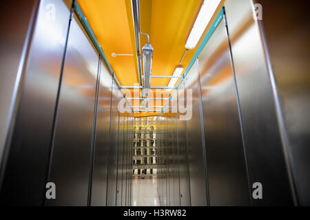 Hallway with a row of server rack Stock Photo