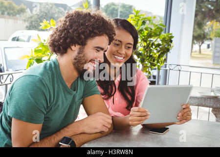 Couple looking at digital tablet Stock Photo