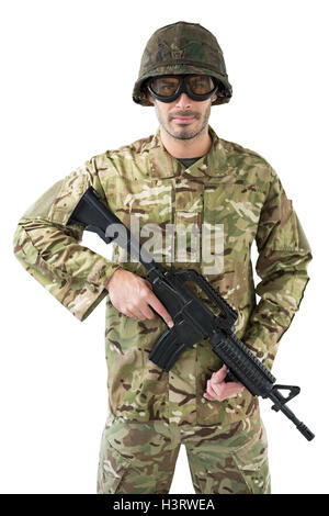 Portrait of soldier holding a rifle Stock Photo