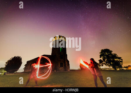 Milky way above Clifton Downs Bristol, with observatory, with light weapon fight Stock Photo