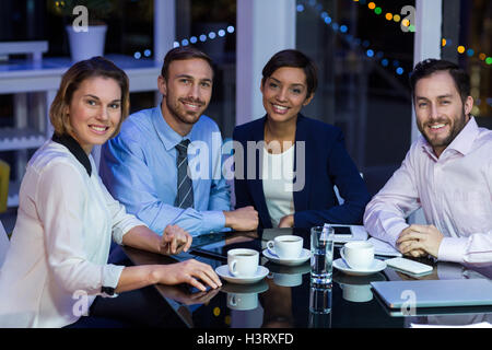 Businesspeople taking tea break Stock Photo