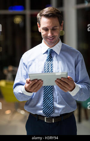 Businessman using digital tablet Stock Photo