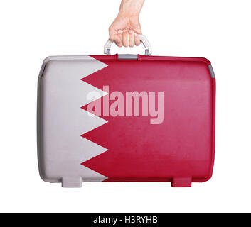 Used plastic suitcase with stains and scratches Stock Photo