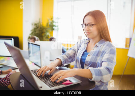 Graphic designer working with laptop Stock Photo