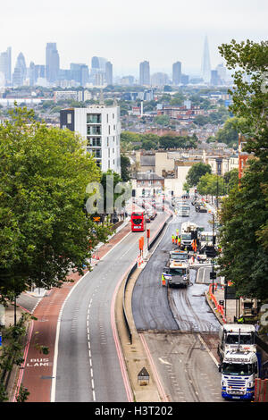 The A1 Archway Road being resurfaced, looking South to the City of London, from Hornsey Lane Bridge, North Islington, London, UK Stock Photo