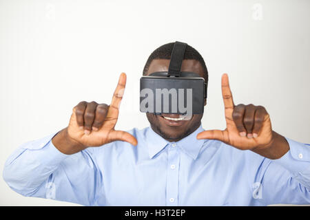 Man using virtual reality headset Stock Photo