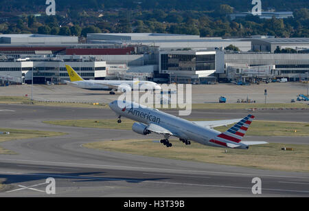 A American Airlines aircraft takes off from London's Heathrow Airport. Stock Photo