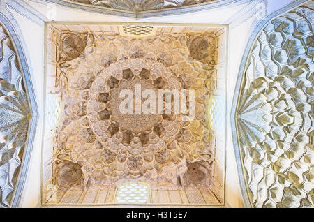 The interior of Kazi Zade Rumi mausoleum with the beautiful ceiling made of carved plaster, Shah-i-Zinda Ensemble in Samarkand. Stock Photo