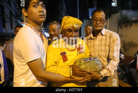 Kathmandu, Nepal. 11th Oct, 2016. Devotees participate in Khadga Jatra(Sword Procession) on Dashami, the tenth day of Dashain festival in Kathmandu, Nepal. Newar community of valley take out a victory parade of sword procession from different places. © Archana Shrestha/Pacific Press/Alamy Live News Stock Photo