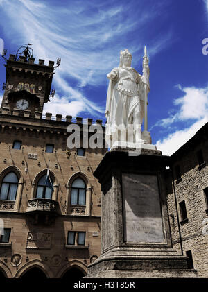 Statue of Liberty in San Marino Country and the ancient palace called Palazzo Pubblico seat of Government in Central Italy Stock Photo