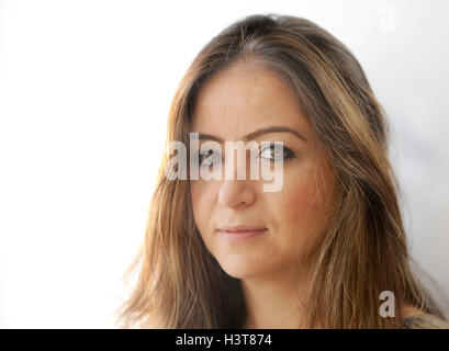 Syrian journalist Zaina Erhaim, 31, who had her passport taken off her by the British government after the Syrian authorities reported it stolen. Stock Photo