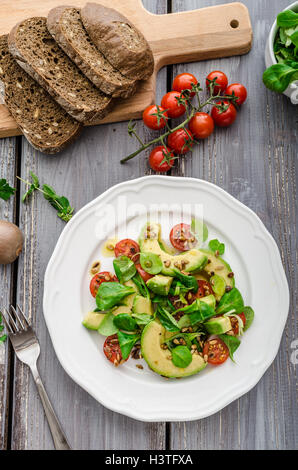 Salad With Shrimp, Arugula ,cucumber And Onion On A White Plate Stock 