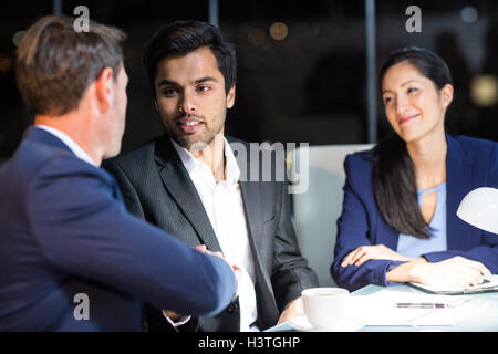 Businessman shaking hands with a colleague Stock Photo