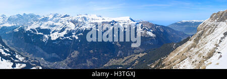 The top view of the snowbound Alps from the top of Mount Mannlichen, Grindelwald, Switzerland Stock Photo