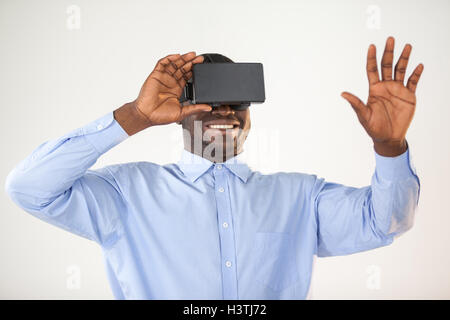 Man using virtual reality headset Stock Photo