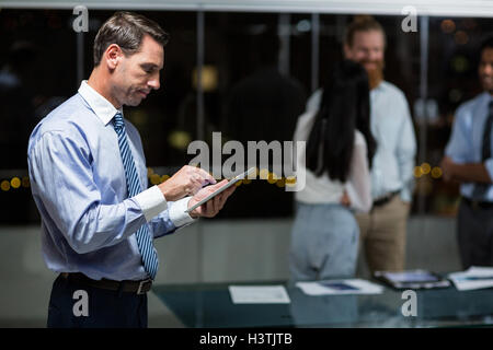 Businessman using digital tablet Stock Photo