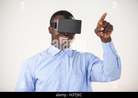 Man using virtual reality headset Stock Photo