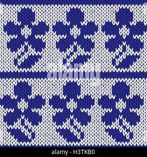 Knitting ornamental seamless colourful vector pattern with rows of dark blue stylized flowers and over white as a knitted fabric Stock Vector