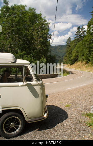 VW Campervan on a mountain road in France Stock Photo