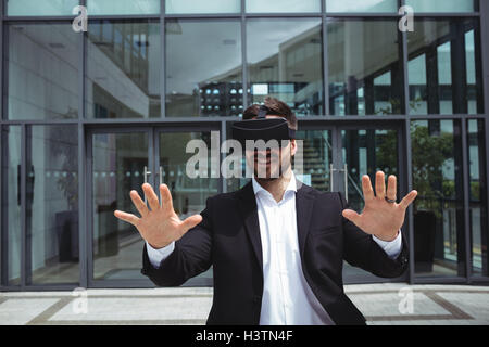 Businessman using reality virtual headset Stock Photo