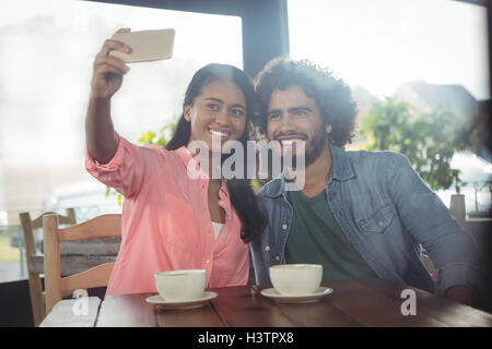 Couple taking selfie from mobile phone Stock Photo