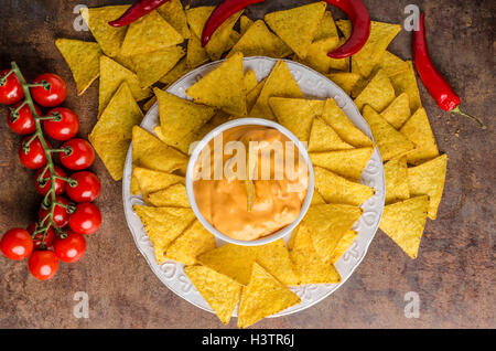 Tortilla chips with two dips, chilli hot and cheese dip Stock Photo