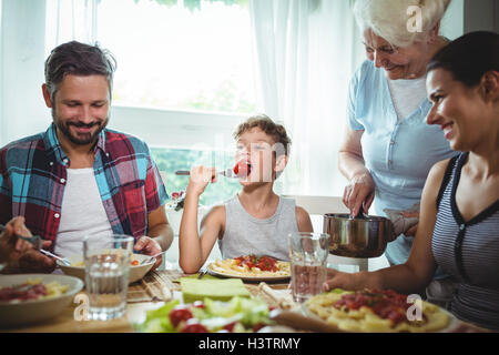 Family having meal together Stock Photo