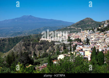 The hilltop city of Taormina with Mount Etna, Sicily, Italy Stock Photo