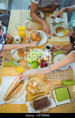 Overhead view of family having breakfast Stock Photo