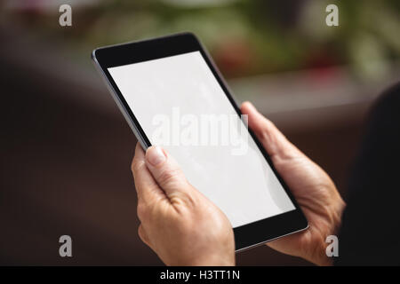 Businesswoman using digital tablet Stock Photo