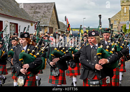 Bagpipers playing instruments in a parade, City of St Andrews Pipe Band, Ceres, Scotland, United Kingdom Stock Photo