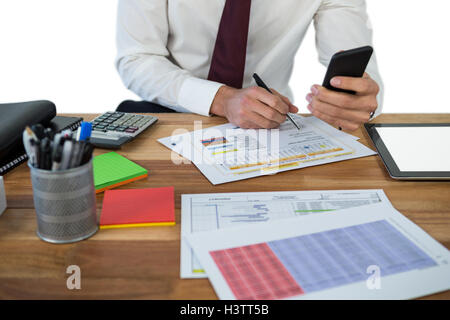 Businessman working at his desk Stock Photo