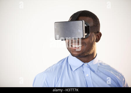 Man using virtual reality headset Stock Photo