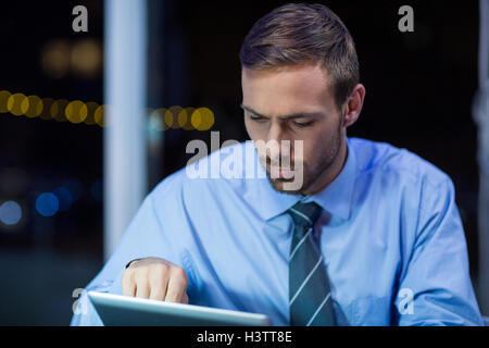 Businessman using digital tablet Stock Photo