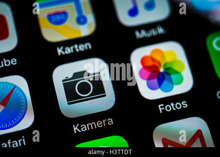 Smartphone screen displaying Maps, Photos, and Camera Apps in detail Stock Photo