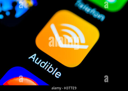 Audible app icon, displayed on smartphone screen Stock Photo